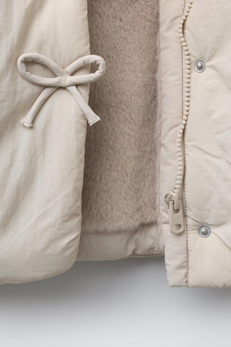 WATER REPELLENT PUFFER COAT WITH BOWS