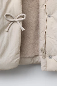WATER REPELLENT PUFFER COAT WITH BOWS