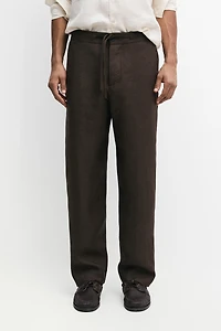 Faded total look linen trousers