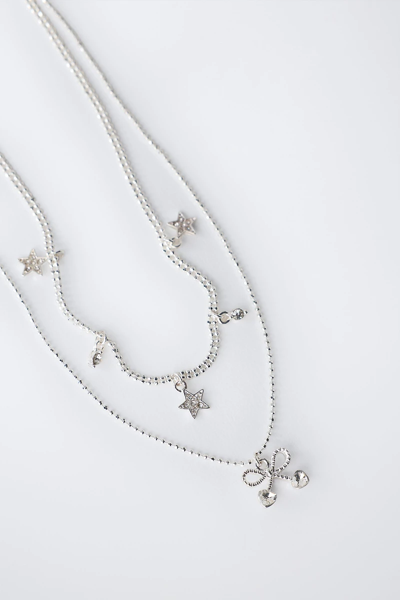 PACK OF TWO STAR AND CHERRY PENDANT NECKLACES