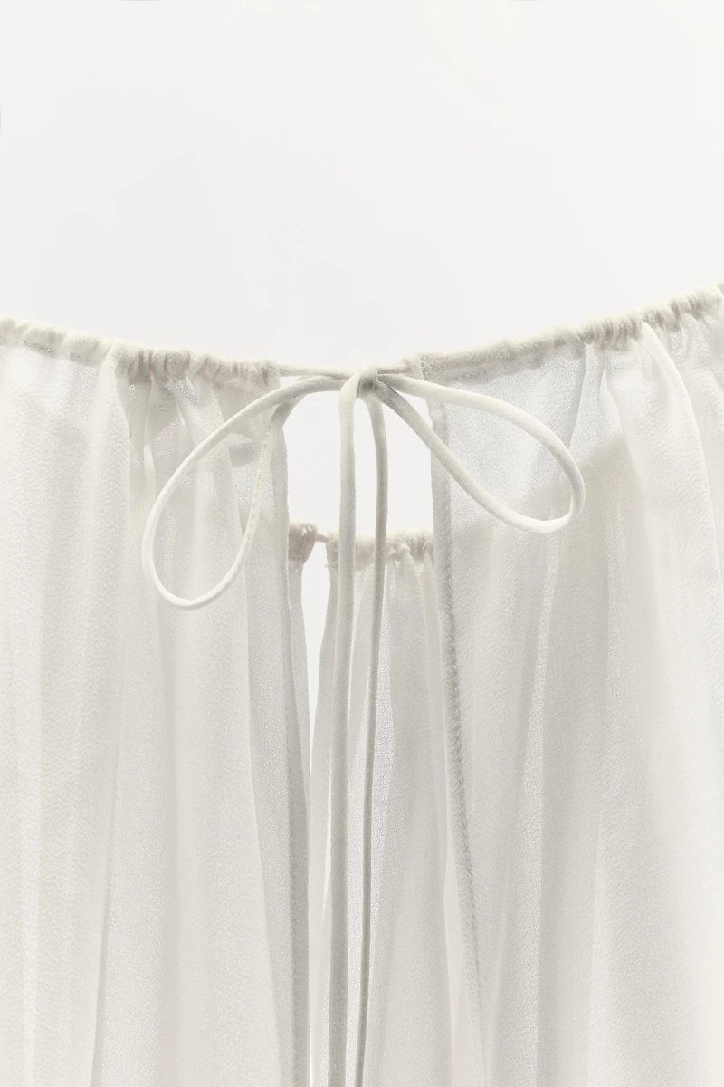 ASYMMETRIC LONG CAPE