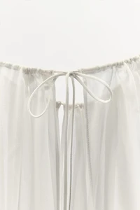 ASYMMETRIC LONG CAPE