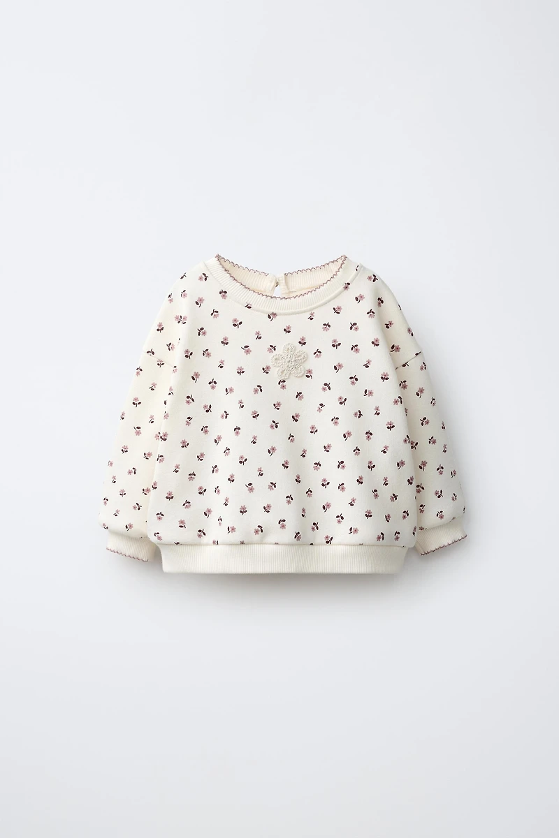 FLORAL PRINT SWEATSHIRT