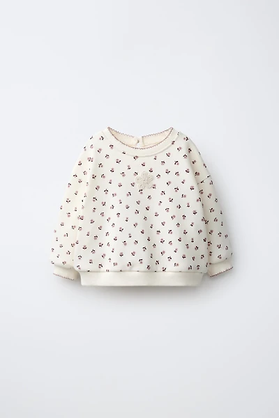 FLORAL PRINT SWEATSHIRT
