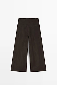 Wide-leg flowing trousers with darts