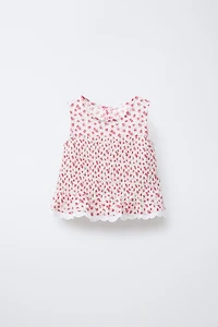 TOP PETITES FLEURS