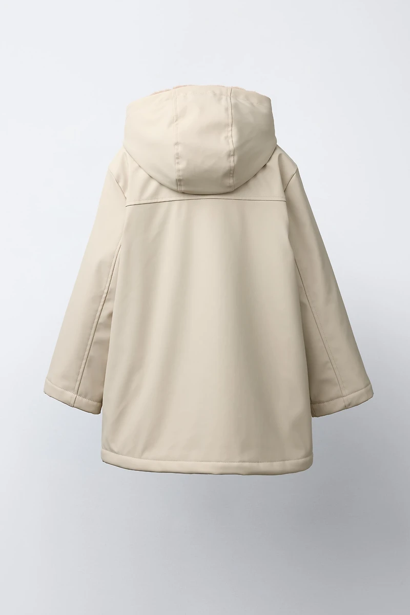 RUBBERIZED WATER RESISTANT FUR EFFECT RAINCOAT