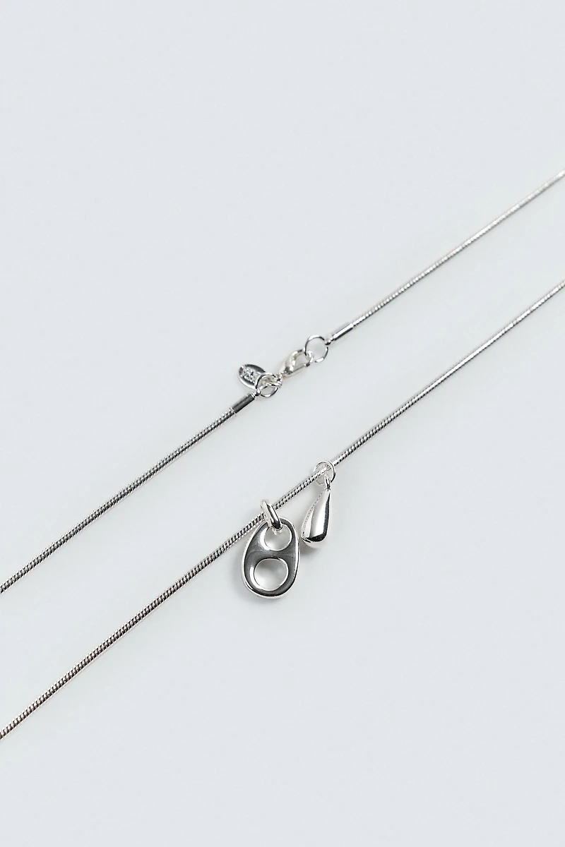 TUBULAR CHAIN WITH PENDANTS
