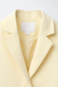 VESTE AVEC DÉCORS