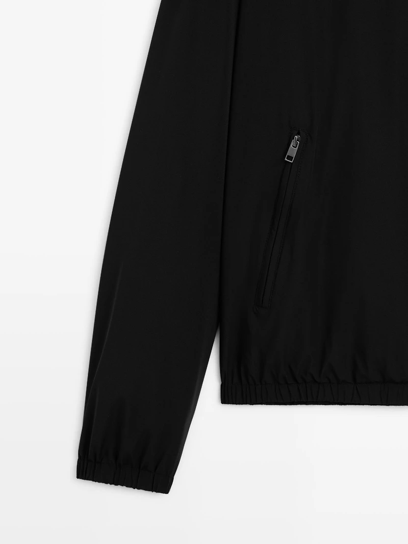 Veste réversible à col montant