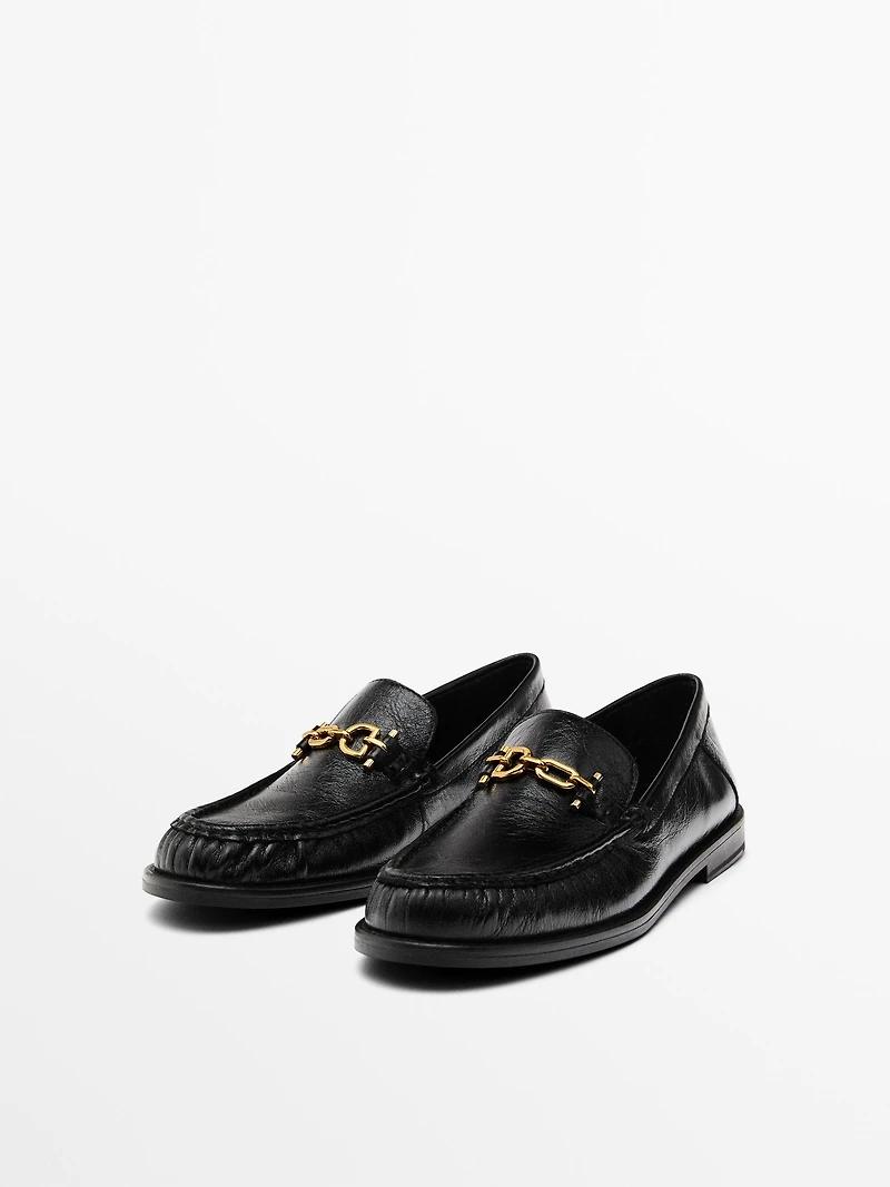 Crackled leather loafers with decorative detail