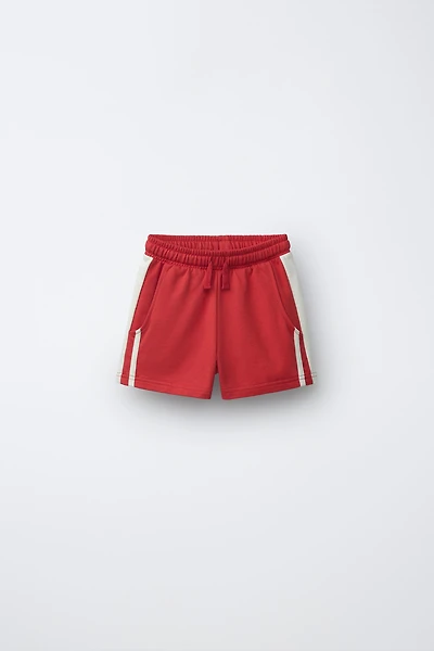 SHORT À BANDES LATÉRALES