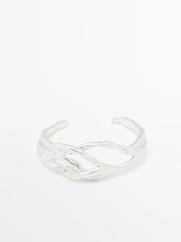 Bracelet métallique abstrait