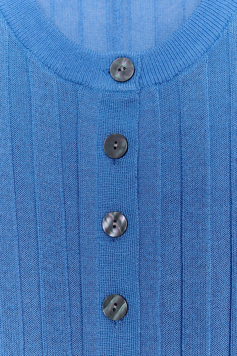ACCORDION SLEEVE CARDIGAN