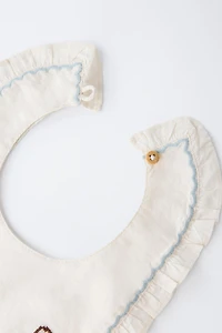 EMBROIDERED BIB