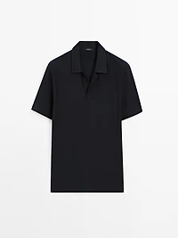 Polo texturé bouton dissimulé