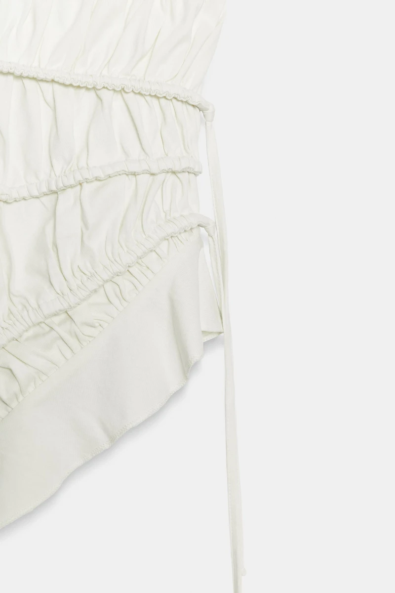 ASYMMETRIC PLEATED TOP
