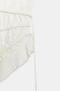 ASYMMETRIC PLEATED TOP