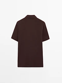 Short sleeve polo shirt with snap-button placket