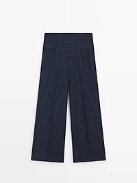 Flare fit linen trousers with striped details