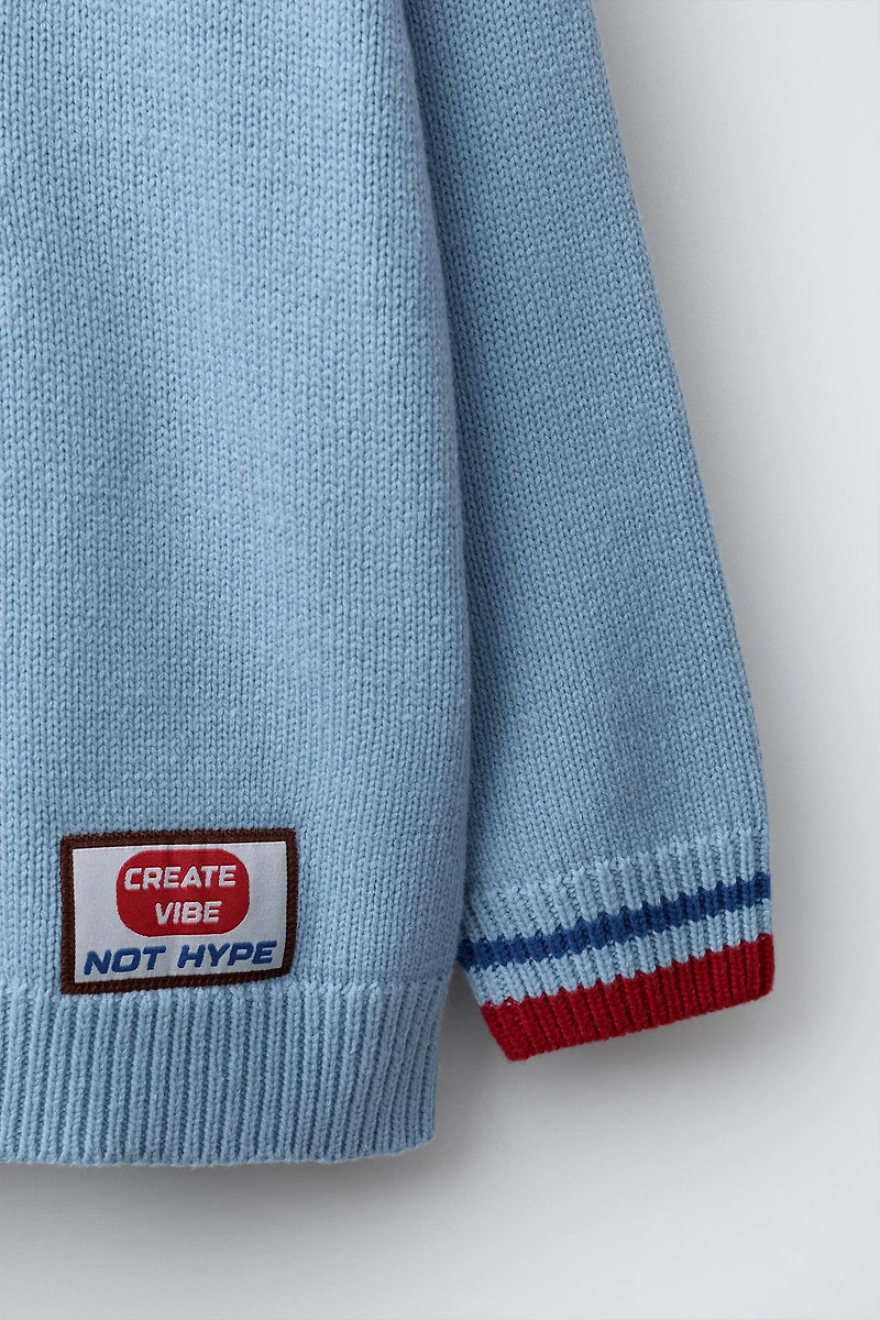 EMBROIDERED AND PATCH KNIT JUMPER