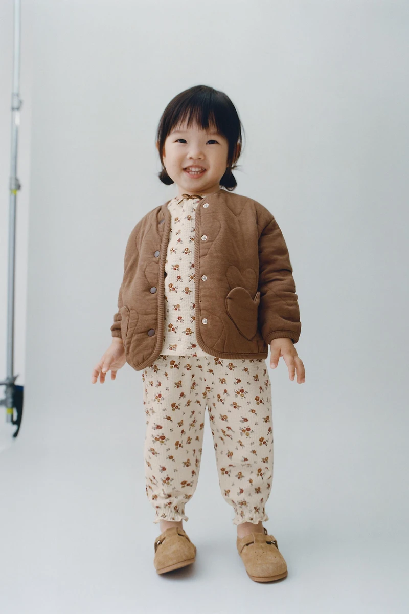 FLORAL EMBOSSED PANTS