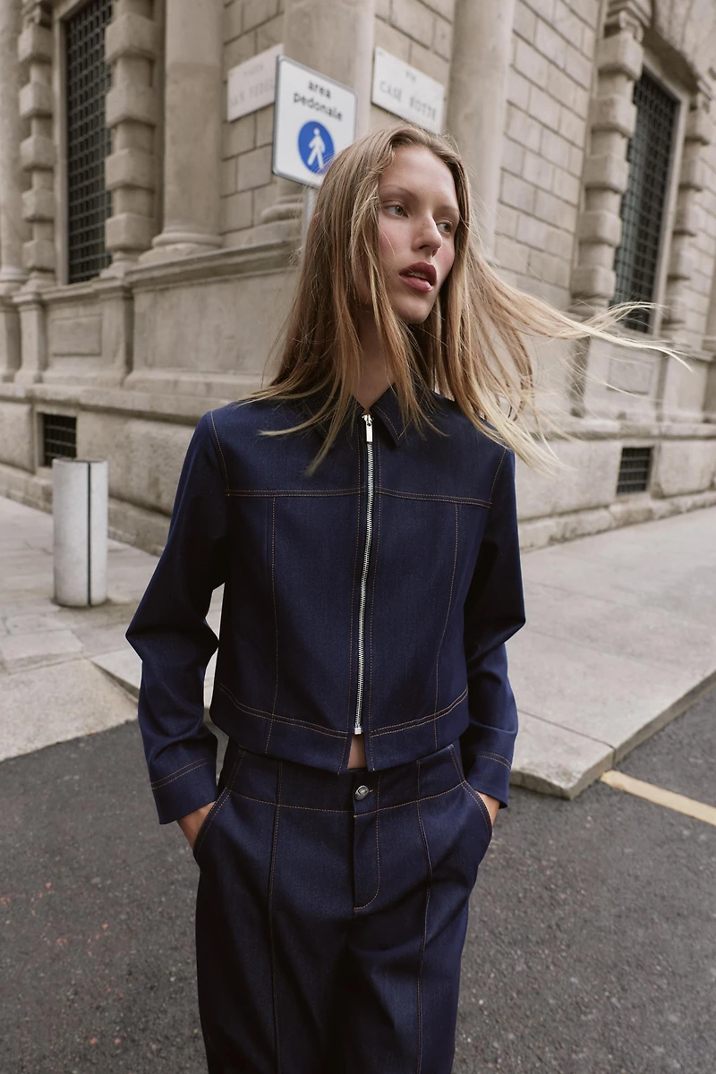 VESTE AVEC SURPIQÛRES À CONTRASTE