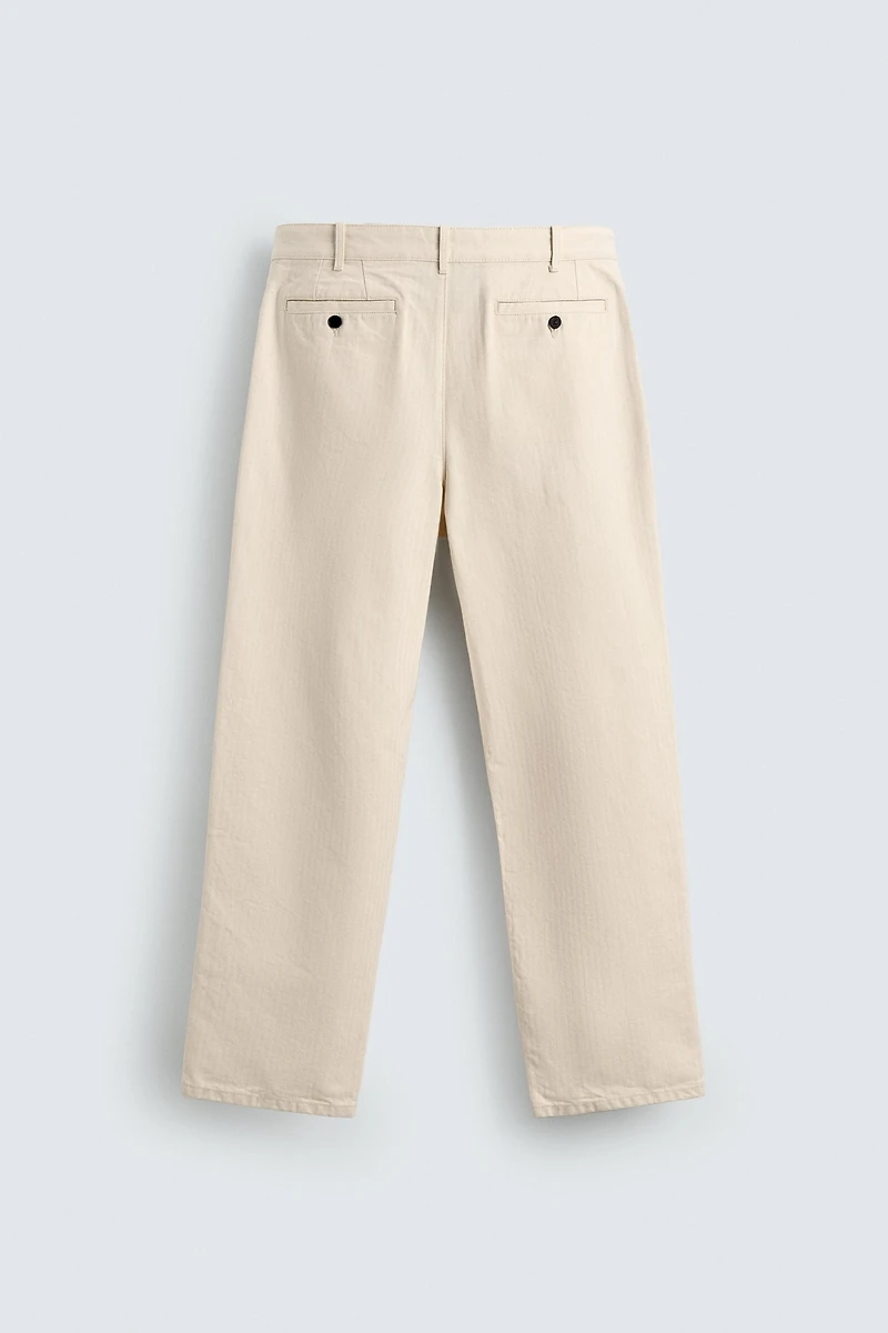 PANTALON PLIS CHEVRONS