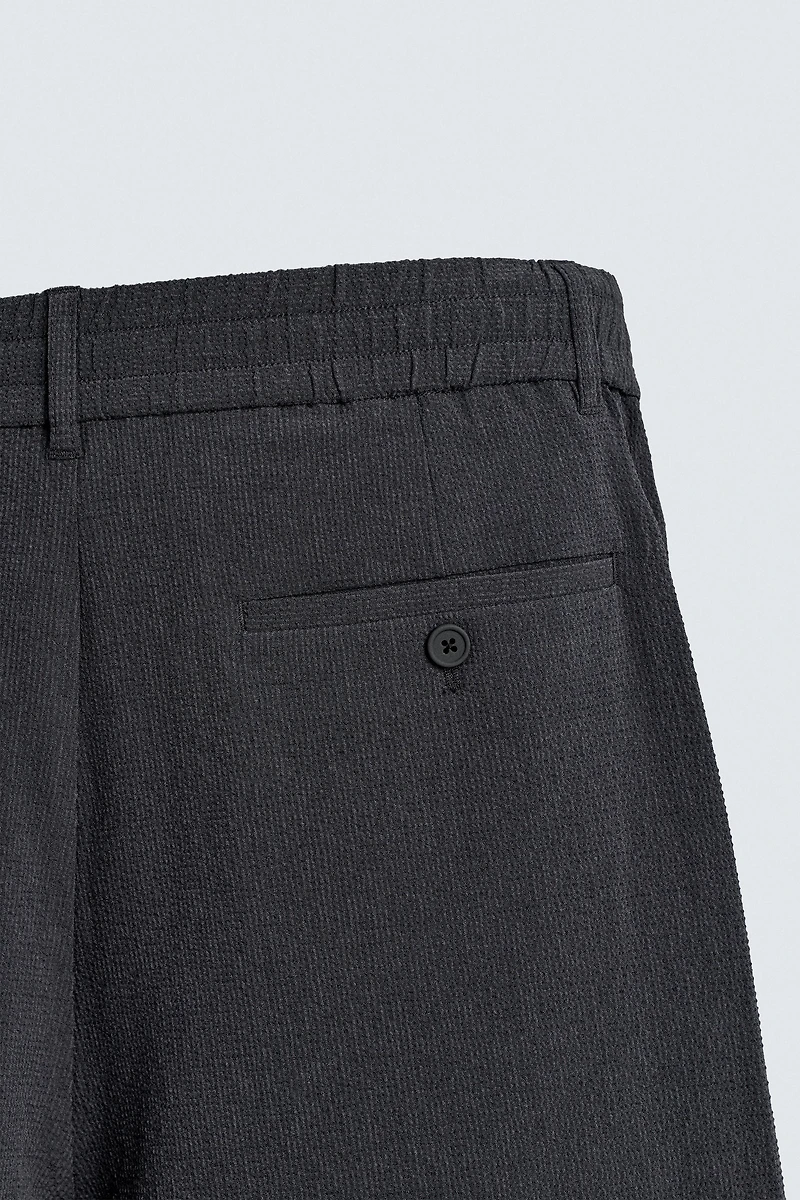 IRREGULAR TEXTURE PLEATED SHORTS