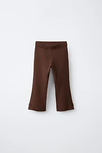 FLARE KNIT PANTS WITH BOWS