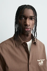 STRIPED GRAPHIC PRINT SHIRT