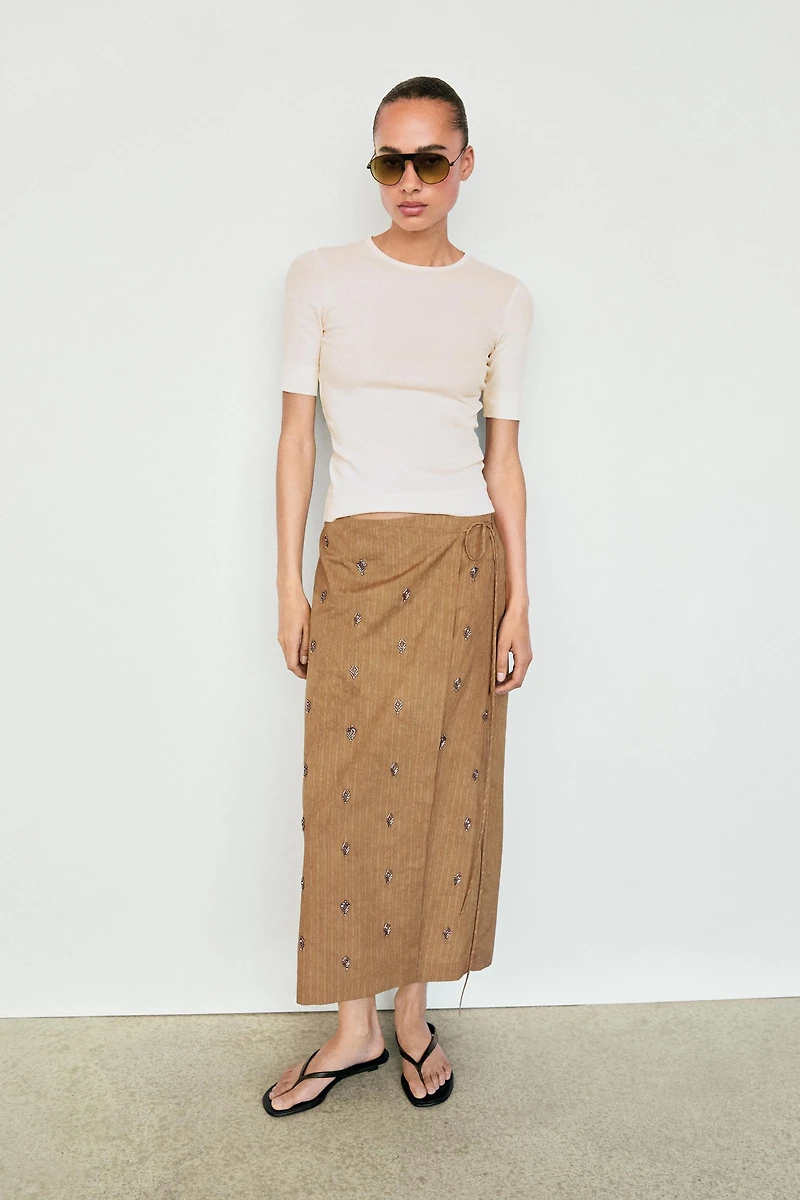 Midi pareo skirt with appliqués