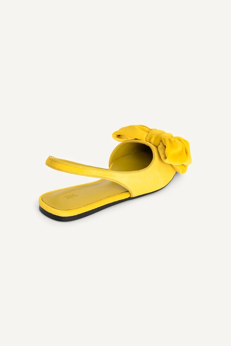 CHAUSSURES PLATES OUVERTES À L'ARRIÈRE AVEC MAXI NŒUD LIMITED EDITION