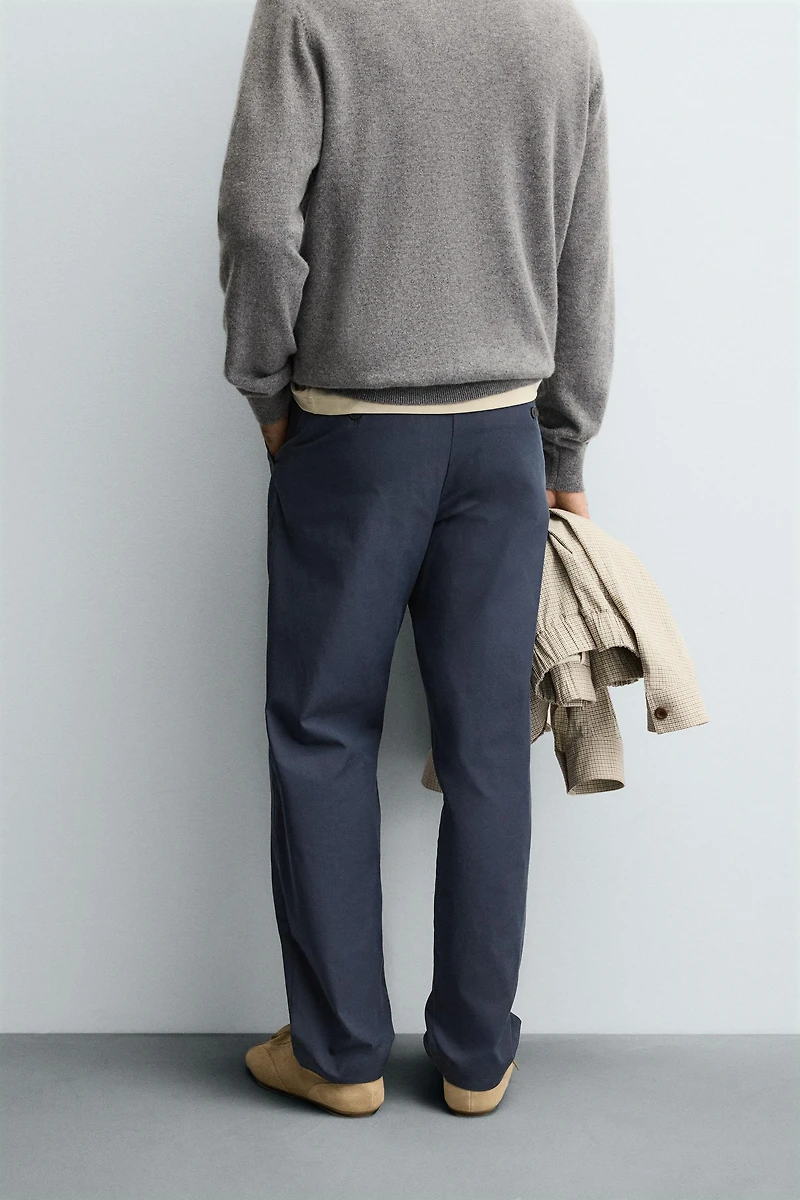 RELAXED FIT PLEATED PANTS