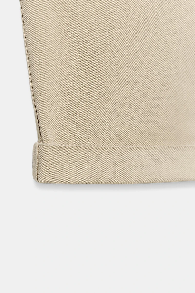 PANTALON CHINO BAS À REVERS