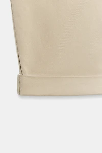 PANTALON CHINO BAS À REVERS