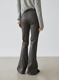 Waxed flare fit trousers