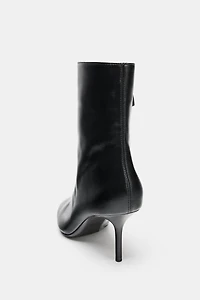 CRACKLED EFFECT HEELED ANKLE BOOTS