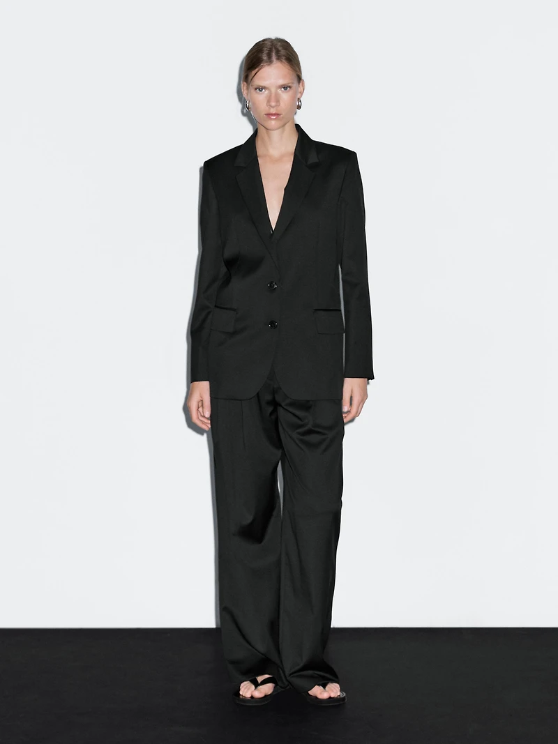 100% extra fine wool pleated trousers