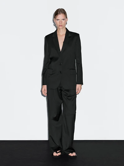 100% extra fine wool pleated trousers