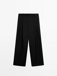 100% extra fine wool pleated trousers