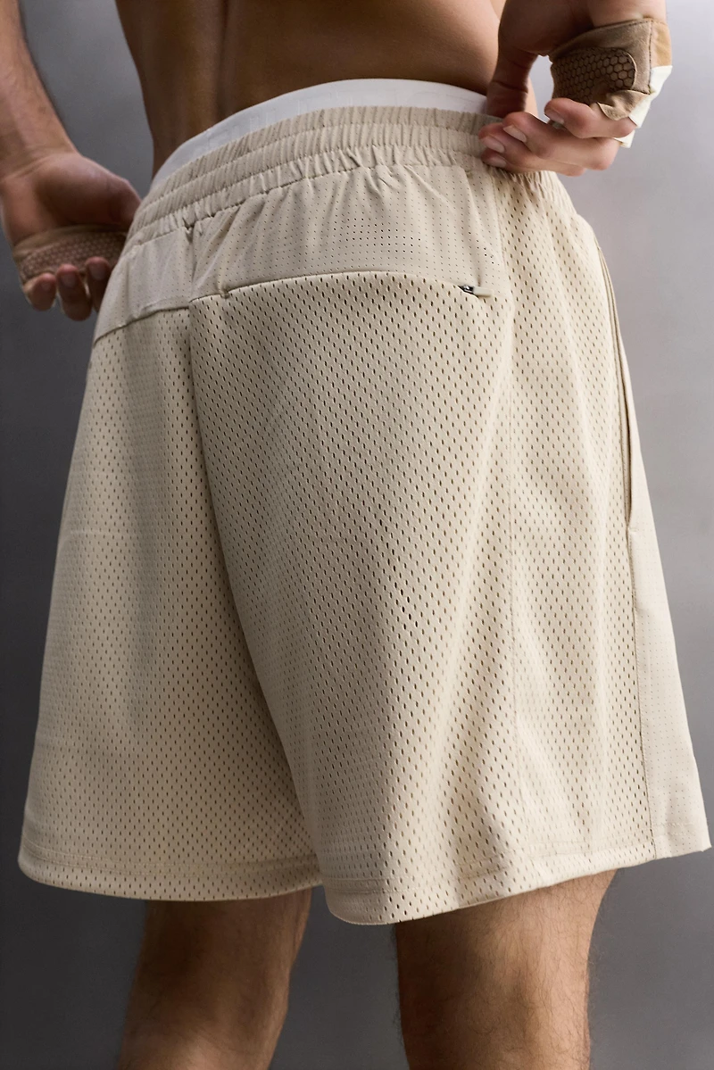COMBINED PERFORATED SHORTS