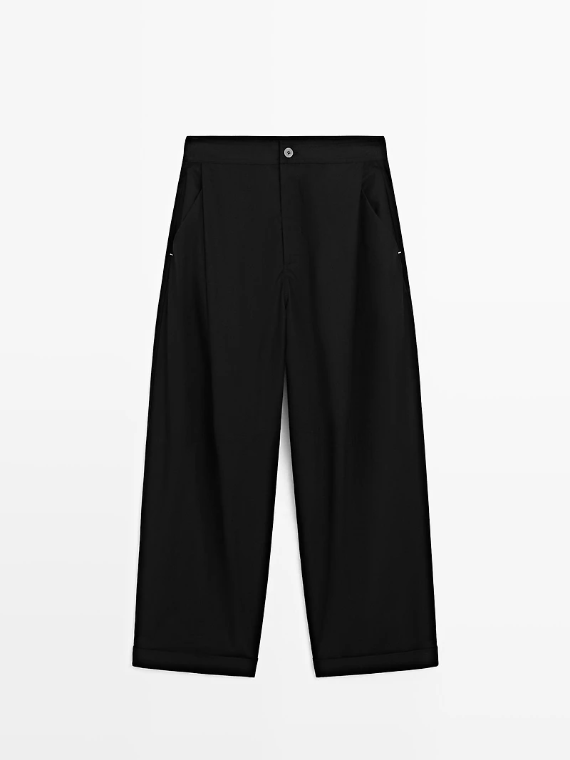 Barrel fit trousers with turn-up detail