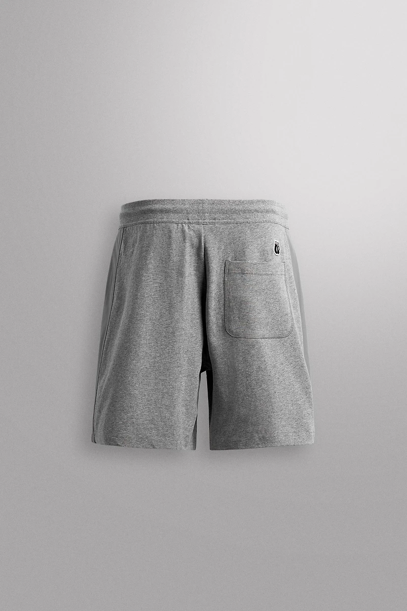 EMBROIDERED SIDE STRIPE 9" SHORTS