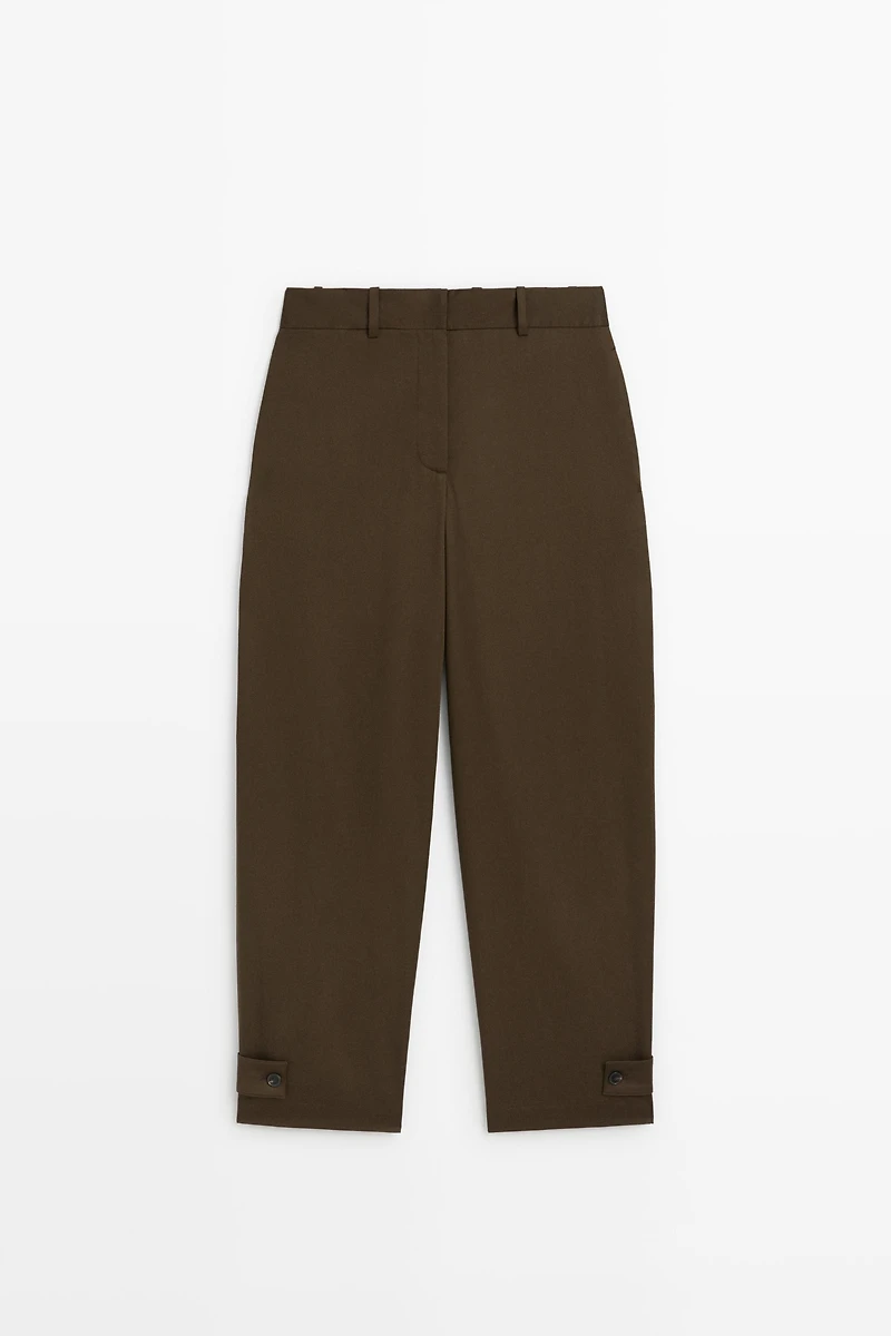 Pants with button-tab hem detail