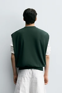 GILET INTERLOCK STRUCTURÉ PIQUÉ
