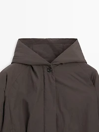 Veste bomber à capuche déperlante