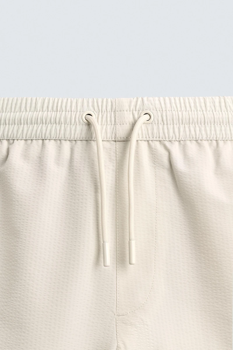 SEERSUCKER SWIM TRUNKS
