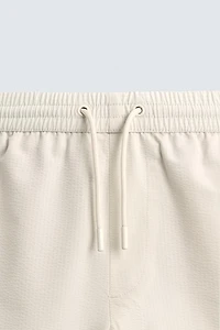 SEERSUCKER SWIM TRUNKS