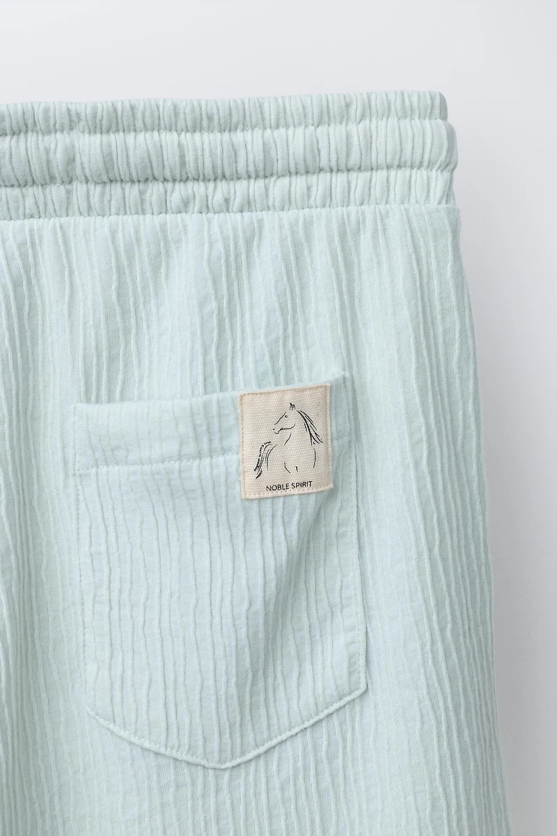 ENSEMBLE T-SHIRT POLO ET SHORT TEXTURÉ